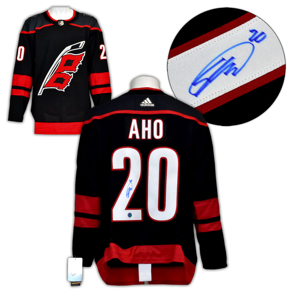 Sebastian Aho Carolina Hurricanes Signed Alt Black Adidas Jersey | AJ Sports.