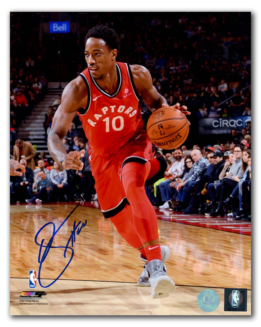 DeMar DeRozan Toronto Raptors Autographed Dribble 8x10 Photo | AJ Sports.