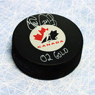 Theo Fleury Team Canada Autographed Hockey Puck with 02 Gold Note | AJ Sports.